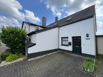 Bild (1) - Haus im Haus: Besondere Maisonette-Wohnung mit Wohlfühlgarten am beliebten Naturschutzgebiet